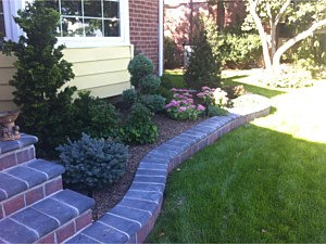 red gray fire island ruby onyx 6x9 techo bloc retaining wall planter box flower garden bullnose top nicolock cambridge
